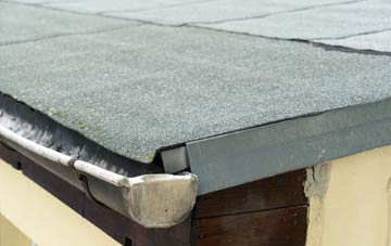 repair or replace Marston Trussell flat roofing?